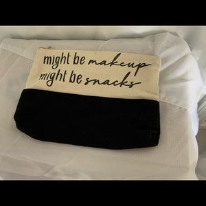 Tan and black makeup bag